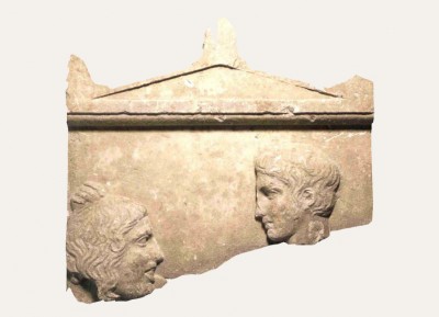 Tombstone (stele) of a hypocrites who is holding a theatrical mask (ca. 420 B.C.), Piraeus Archaeological Museum.