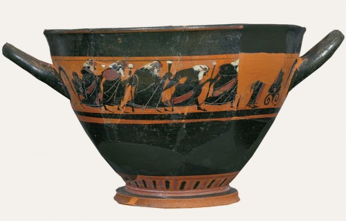 Drinking cup mainly used in symposia (kylix) depicting members of a chorus impersonating elderly men (ca. 350 B.C.), Thebes Archaeological Museum.